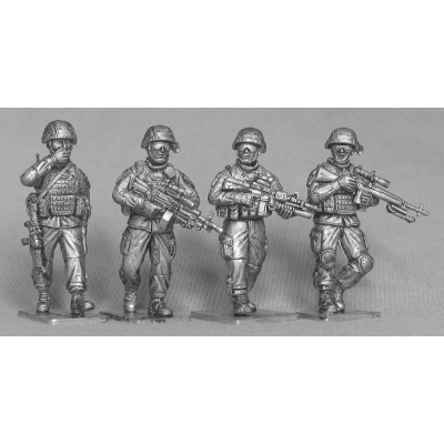 Four US infantry on patrol.